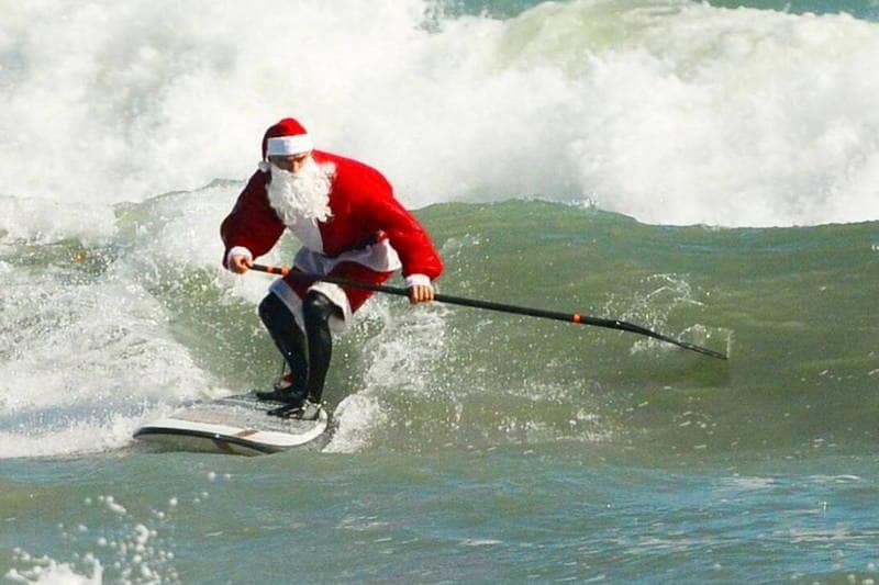 A Surfing Santa on the Cocoa Beach Waves