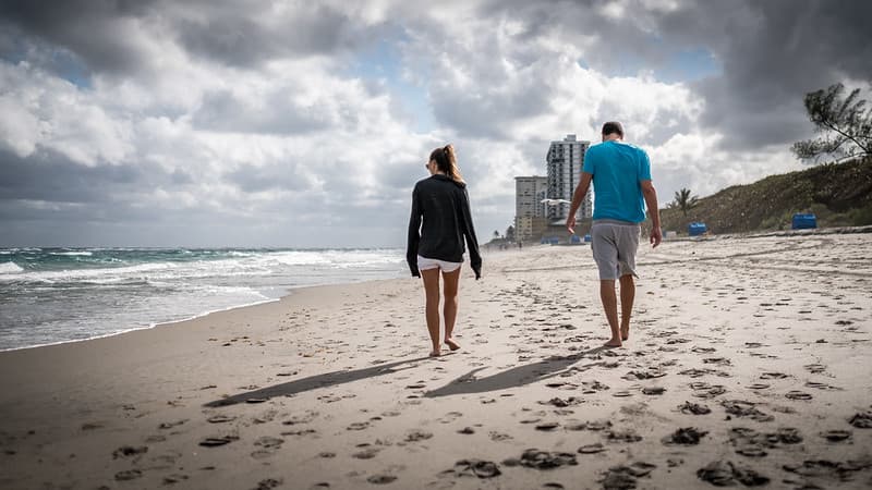 Couple walking on the beach
