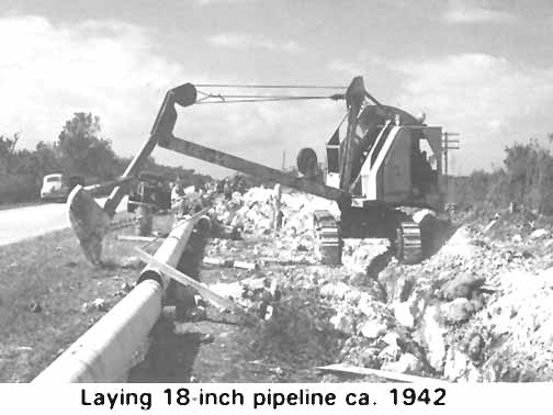 Excavator Laying Pipeline in 1942