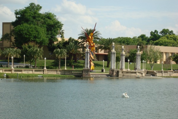 Swan and Statue on Lake